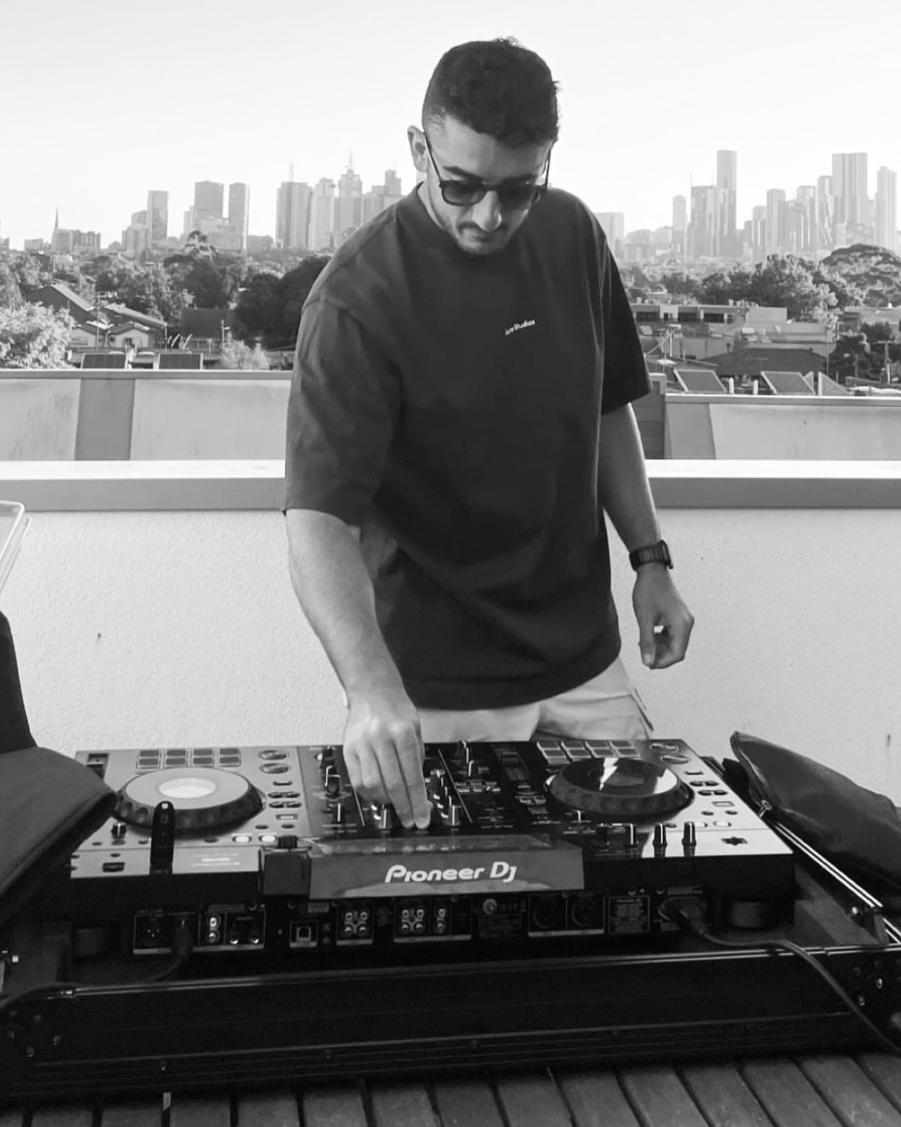 A rooftop set above the Melbourne skyline