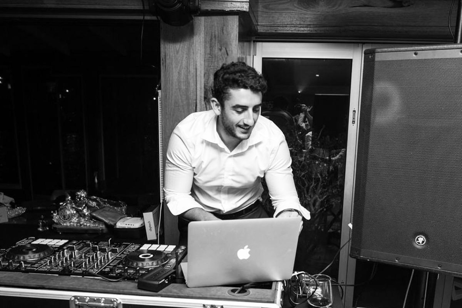 Working the mixer and laptop through a set